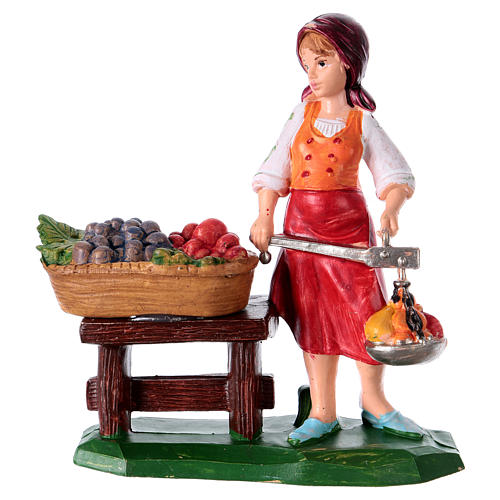 Peça vendedora de fruta para presépio com figuras altura média 10 cm 1