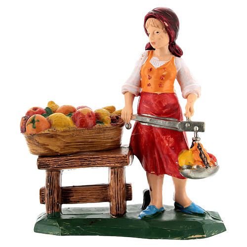 Peça vendedora de fruta para presépio com figuras altura média 10 cm 3