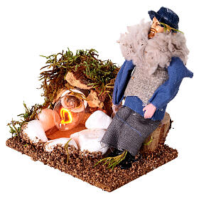 Shepherd at a fire with lights terracotta and plastic, 12 cm nativity