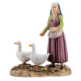 Pastorella con oche per presepe da 10 cm resina colorata