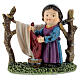 Woman hanging laundry kids nativity line 9 cm s1