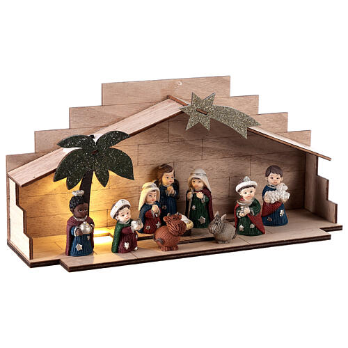 Wood stable with Nativity Scene of children, resin, characters of 5 cm, 10x25x5 cm 3