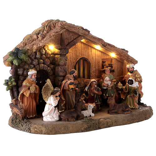 Resin stable with Nativity Scene of 10 cm, music and light, 25x35x15 cm 4