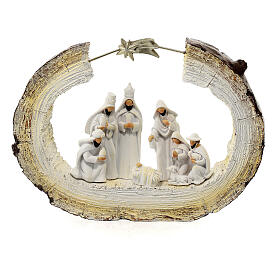 Stylized Nativity scene on trunk with star 20 cm resin