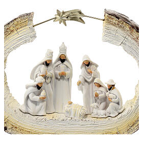 Stylized Nativity scene on trunk with star 20 cm resin