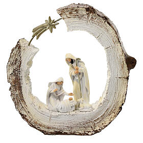 Stylized Holy Family statue on trunk with resin star 20 cm