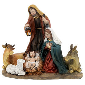 Natividade com boi, burro e ovelha resina pintada 30x28x15,5 cm