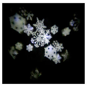 Projecteur laser Noël: Projecteur 4 led blancs flocons neige sur piles