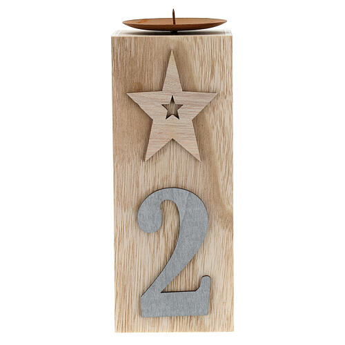 Beige wooden candle holder characterised by various decorations 4