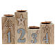 Beige wooden candle holder characterised by various decorations s1