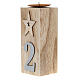 Beige wooden candle holder characterised by various decorations s2