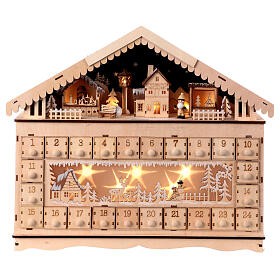 Wooden house Advent calendar snowy town 40x50x10 cm