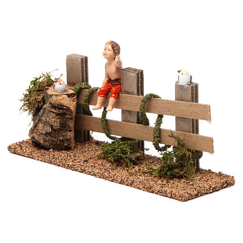 Child on a Fence 10X20X5 cm for 10 cm Nativity  2