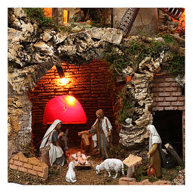 Stables and grottos: Illuminated village with waterfall and 9-10 cm figurines, 40x60x40 cm Stables and grottos: Illuminated village with waterfall and 9-10 cm figurines, 40x60x40 cm