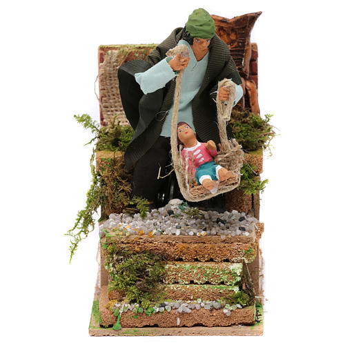 Moving figurine for Nativity scene, shepherd with child 10 cm 1