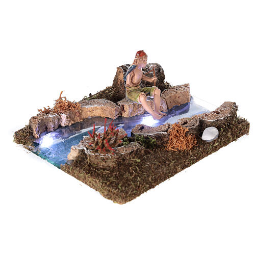 River with battery-operated led lights and fisherman 10x15x15  4