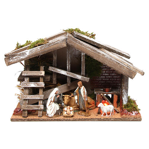 Stajenka drewniana ze sceną narodzenia Jezusa Moranduzzo i piecem, 25x35x15 cm 1