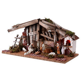 Capanne Presepe e Grotte: Fienile con Natività 10 cm e pastore 25x50x25 cm