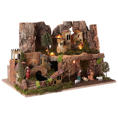 Village setting for Nativity scene with fountain, cave and lights 35x55x40 cm 4