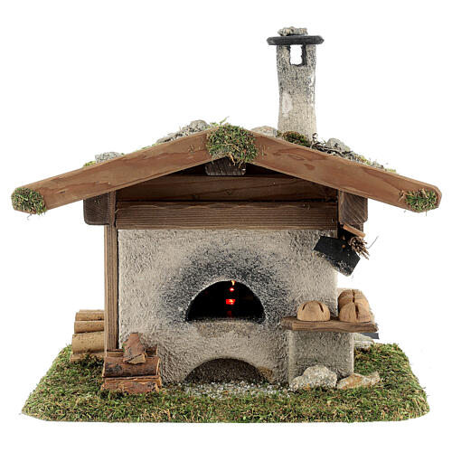 Alpine-style oven with 230V light 22x20x22 cm for 8-10cm Nativity Scene comes in assorted models. 2