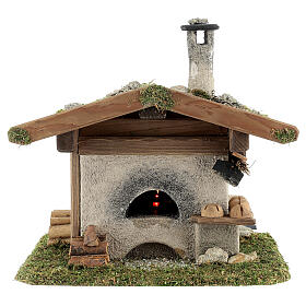 Oven for nativity scene 8-10 cm, alpine style with lighting 230V 22x20x22 cm comes in assorted models.