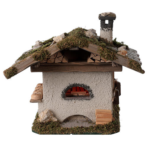 Oven for nativity scene 8-10 cm, alpine style with lighting 230V 22x20x22 cm comes in assorted models. 1