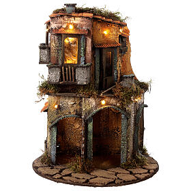 Illuminated house with round base 25x25 cm, Neapolitan nativity