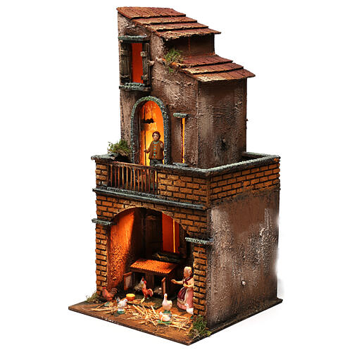 Illuminated house with square base with Neapolitan nativity figurines 2