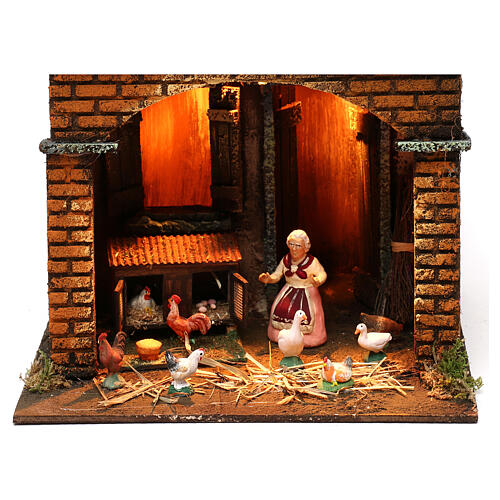 Illuminated house with square base with Neapolitan nativity figurines 4