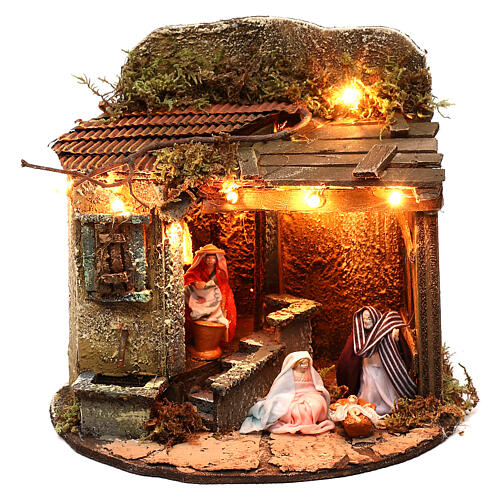 Illuminated village on a round base with Holy Family, 15x20 cm Neapolitan nativity 1