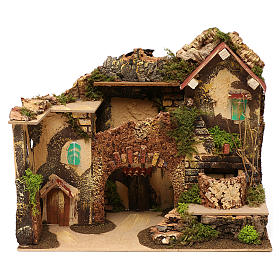 Casetta con arco e fontana con pompa 220V presepi di 10 cm 30x30x20 cm