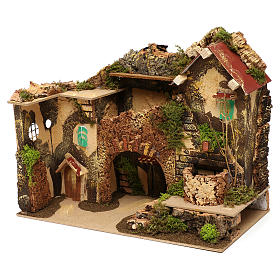 Casetta con arco e fontana con pompa 220V presepi di 10 cm 30x30x20 cm