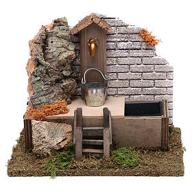 Mountain fountain with bucket Nativity scene 10 cm