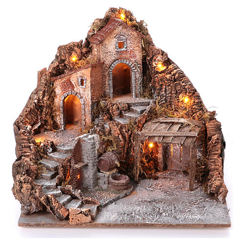 Nativity village with central fountain, left staircase 40x45x45 lighted 6-8-10 cm 1