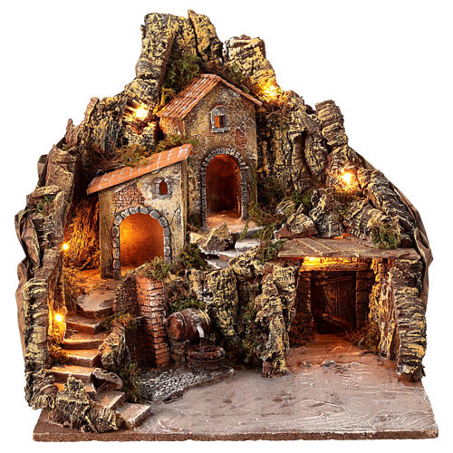 Nativity village with central fountain, left staircase 40x45x45 lighted 6-8-10 cm 1