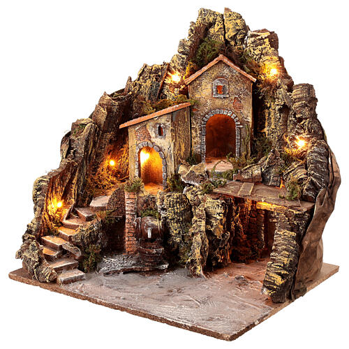 Nativity village with central fountain, left staircase 40x45x45 lighted 6-8-10 cm 3