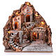 Nativity village with central fountain, left staircase 40x45x45 lighted 6-8-10 cm s1