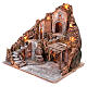 Nativity village with central fountain, left staircase 40x45x45 lighted 6-8-10 cm s2