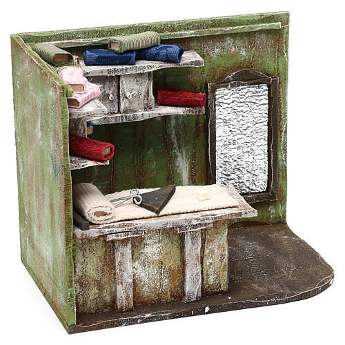Tailor shop with fabrics 12 cm nativity, 15x15x10 cm 3