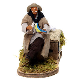 Moving sitting man with parrot Neapolitan Nativity Scene 12 cm