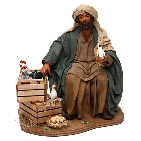 Uomo seduto con pollaio 24 cm presepe napoletano