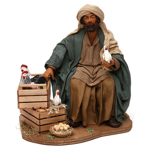 Uomo seduto con pollaio 24 cm presepe napoletano 1