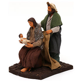 Man covering wife and baby, Neapolitan Nativity scene 10 cm