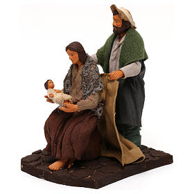 Man covering wife and child, 12 cm Neapolitan nativity