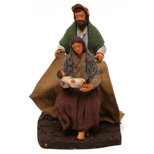 Man covering wife and child, 12 cm Neapolitan nativity 1