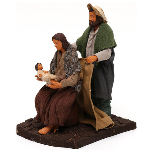 Man covering wife and child, 12 cm Neapolitan nativity 2