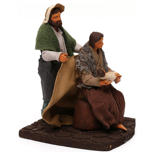 Man covering wife and child, 12 cm Neapolitan nativity 3