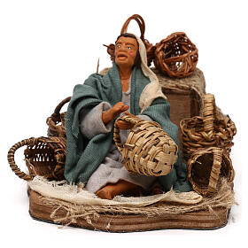 Arabski sprzedawca słomianych koszów, ruchoma figurka do szopki neapolitańskiej 12 cm