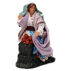 Woman sitting with basket of apples, 12 cm Neapolitan nativity