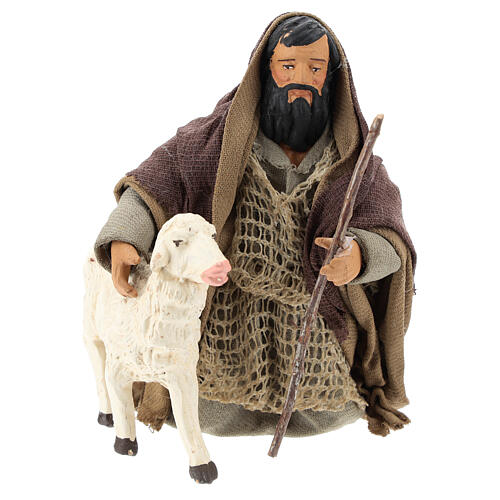 Pasterz arabski klęczący z owieczką 14 cm 1
